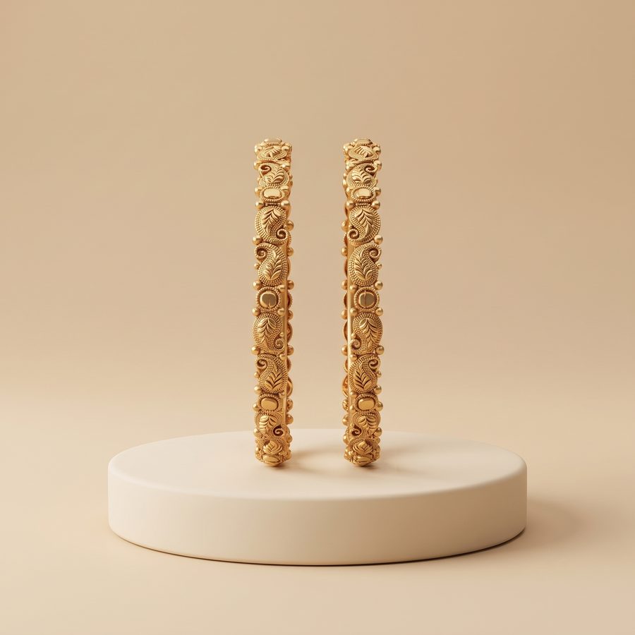 Gold floral engraved bangle pair