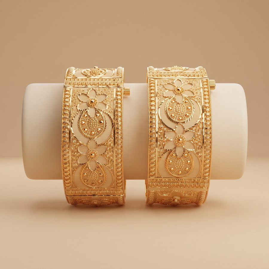 Slim carved gold bangle pair, bridal style
