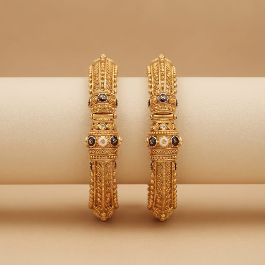 Antique gold kada with enamel and stone detailing