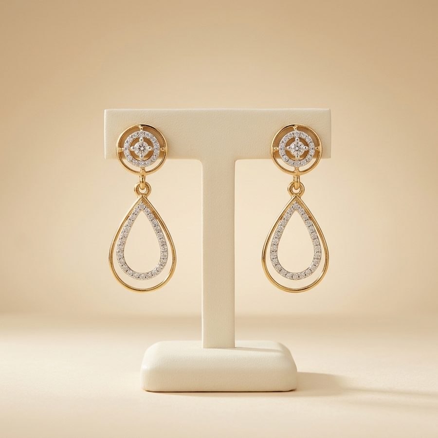 Gold chandbali earrings with ruby accents and bead drops